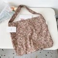 Detailed flat lay of floral canvas shoulder bag with aesthetic dried flower decor - 12 Lotus Pink Acacia Print