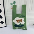Cute green knitted vest tote bag with white flower and brown bear design - Green Base Floral