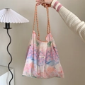Detail view of Sozakka tote bag showing oil painting floral prints and woven handle - Pink Flower Sea
