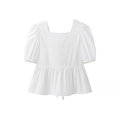Close-up detail of white puff sleeve blouse with ruffled hem and smooth cotton fabric - S / White