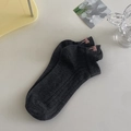 Dark grey ribbed ankle socks featuring a sweet pink embroidered bow on the heel - One Size / Dark Gray