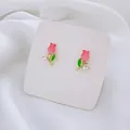 Pink tulip flower earrings with S925 silver needle and green leaves on white background - Zircon Tulip Stud Earrings