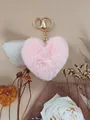 Portachiavi a forma di cuore in finta pelliccia rosa con anello in metallo dorato - Rosa