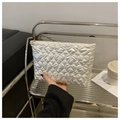 Chic pearlescent white clutch featuring heart-shaped quilting and a gold zipper detail - White