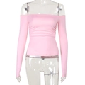 Detailed close-up of pink off-the-shoulder long sleeve top with subtle ruched fabric texture - S / Pink