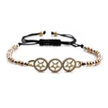 Adjustable woven bracelet with gold-plated star charms and mixed metallic beads on black cord - Multicolor