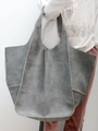Detail of grey tote bag showing retro grainy leather texture and large capacity - Gray