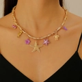 Conjunto de collar bohemio con estrella de mar dorada y detalles morados - Collar del Océano con Charms de Caballito de Mar y Tortuga Dorado (8415)