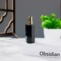 Nachfüllbarer Parfümzerstäuber aus Obsidian im Sechskant-Design mit goldener Düse - Obsidian
