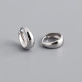 Macro shot of S925 sterling silver hallmark on the polished wide band hoop earrings - Inner Diameter 9mm / White Gold