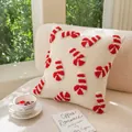 Christmas tufted pillow cover featuring red and white candy cane patterns on white fabric - Loop Canvas Candy Cane Small