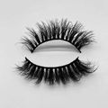 Detailed close-up of 3D layered faux mink eyelashes with dense black curls and thick band - D78