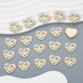 Macro shot of colorful enamel heart charms with evil eye motifs for jewelry making - Style YJ13-04