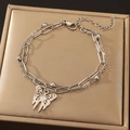Double-layered silver stainless steel bracelet featuring a delicate hollow butterfly pendant - Silver Layered Hollow Butterfly Bracelet (3580)