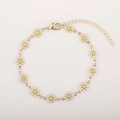 Elegant gold daisy bracelet with white enamel petals and adjustable extension chain - White Daisy