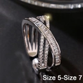Silver geometric crossover ring with baguette diamonds in sizes 5 to 7 - Q863 White Gold Small (Size 5-7)