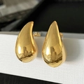 Detailed view of luxury gold teardrop earrings with high-polish mirror finish and 925 silver studs - Large (4.3*2.4) / Gold