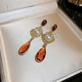Close-up of vintage floral drop earrings with gold carving and amber gemstones - Brown Rhombus Pendant Style (7#)