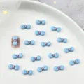 Cute light blue resin bow nail charms with pink gold accents for DIY nail art design - Blue