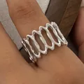 Polished silver wave cut-out ring in 316 stainless steel wide band design for women - Hollow Wave Style (PB656) / Silver