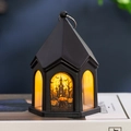 Detailed view of Halloween castle lantern with pumpkin prints on a book - Pumpkin