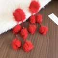 Detail of red pompom earrings with rose flowers and long tassel for winter outfits - Red Rose Hairball Style / Red