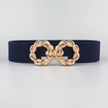 Detailed view of dark blue elastic waist belt featuring a gold twisted metal buckle - Navy Blue