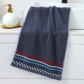 Dark blue cotton towel featuring classic red white blue stripes and checkered hem - Digital Blue Towel