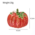 Orange pumpkin brooch with green leaves and gold plating, dimensions 4.5cm by 4.2cm - Orange Pumpkin