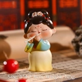 Detailed view of Tang dynasty girl figurine playing flute with size 5x4.2x8cm and 105g weight - Small Flute Playing Lady
