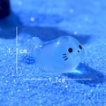 Miniature light blue luminous seal figurine for micro landscape, size 1.1cm by 1.7cm - Looking Up Seal