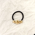 Elastico per capelli nero con tre cerchi cavi in metallo dorato dallo stile minimalista - Oro Tre Sfere 4cm