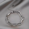 Bracciale a catena argentata con estensione regolabile e ciondolo rotondo lucido - Color Acciaio