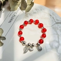 Handmade red beaded bracelet with silver leaf and heart charms on a white plate - S056-large Red Shell Leaf Safety Buckle Bracelet #sz471