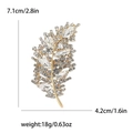 Golden feather brooch with rhinestones measuring 7.1cm by 4.2cm for women's fashion - White