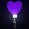 Close-up of glowing purple heart LED stick with white handle and button instructions - Thickened Heart Wand Purple