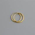 Detailed view of simple golden S925 sterling silver hoop earrings with a polished finish - 16mm / Gold