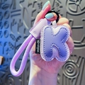 Charming purple leather letter K keychain with litchi texture and matching lanyard - Letter K