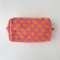 Pink and orange checkerboard knit cosmetic bag with portable side handles - Orange-Pink Checkerboard