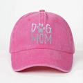 Detailed texture of pink washed cotton baseball cap with gray DOG MOM print and paw icon - One Size / Rose Red