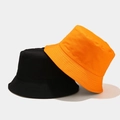 Close-up of double-sided cotton bucket hat featuring reinforced stitching and flat top - M (56-58cm) / Black and Orange