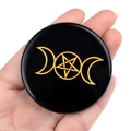 Obsidian stone pad featuring golden triple moon and pentagram symbols, handheld view - Obsidian Triple Moon Style