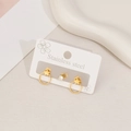 Golden stainless steel star hoop earring set with round zircon stud on a white background - Star Circle Style / Gold