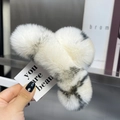 Detailed view of large fluffy white and grey faux rabbit fur hair claw clip for winter - Extra Large / Beige Leopard