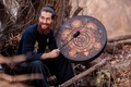 Handmade shamanic drum with tree of life pattern and black mallet in forest setting - Turtle Totem Drum / 25cm