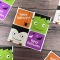 Vibrant Halloween paper napkins with cartoon vampire, Frankenstein and spooky patterns - Cartoon