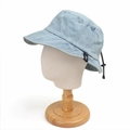 Detail view of adjustable drawstring and texture on light blue denim bucket hat - 59cm (Adjustable) / Light Blue