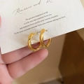 Matte golden twisted hoop earrings with silver needle on white artistic display card - 110# Ear Clip - Gold (Real Gold Plated)