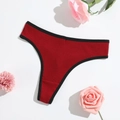 Red ribbed cotton thong with black trim on white background with pink floral accents - Burgundy