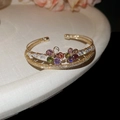Macro detail of gold double-layer open cuff bracelet with multicolored floral gemstones - Double Layer Colored Flower Style (14#)